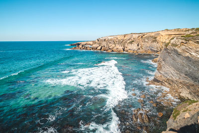 Scenic view of sea against clear sky