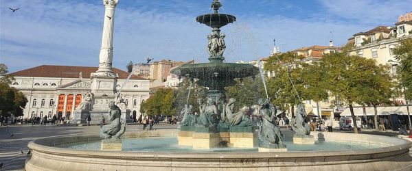 Fountain with buildings in background