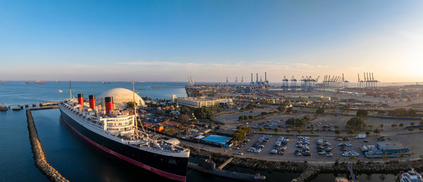 Boats moored at harbor