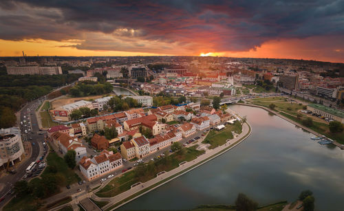 High angle view of river amidst buildings in city