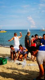 People enjoying at beach