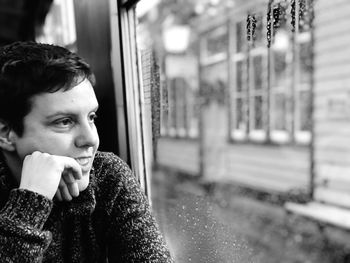 Close-up of woman in window