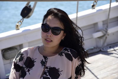 Close-up of young woman wearing sunglasses