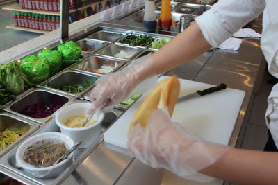 Close-up of person preparing food