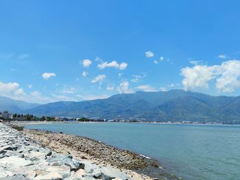 Scenic view of sea against blue sky