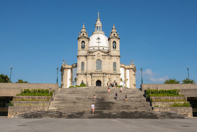 View of historical building against clear blue sky