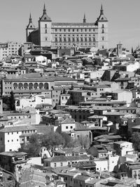 Alcazar with townscape against sky