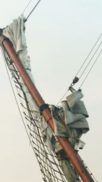 Low angle view of rope against sky