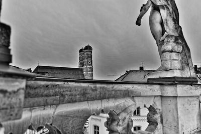 Low angle view of statue against building