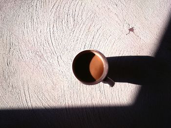 High angle view of coffee cup on table
