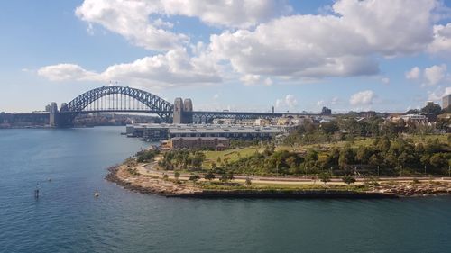 View of bridge over river in city