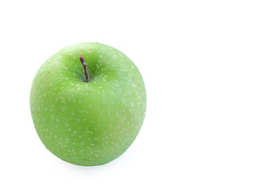 Close-up of apple against white background