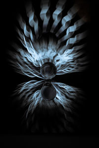 Close-up of illuminated light bulb