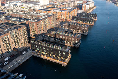 High angle view of illuminated buildings in city