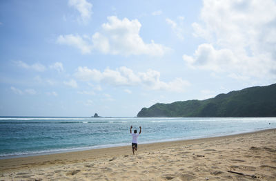 Scenic view of beach against sky