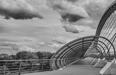 Footbridge against sky