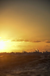 Scenic view of dramatic sky during sunset