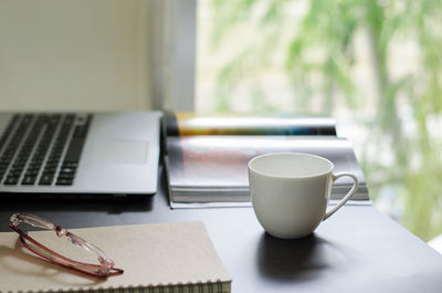 Coffee cup on table