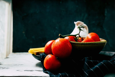 Close-up of fresh fruits in bowl on table