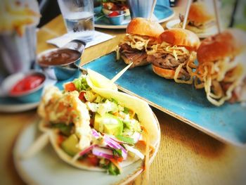 Close-up of food served on table