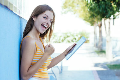Portrait of smiling young woman