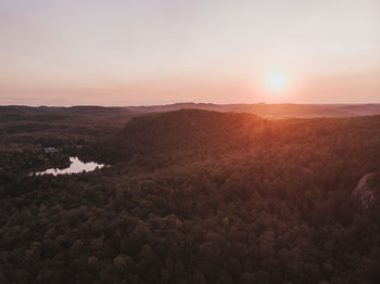 Scenic view of landscape against sky during sunset