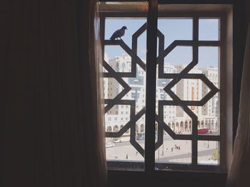 Buildings seen through window