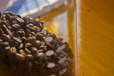 Close-up of coffee beans in glass