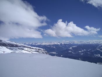 Scenic view of snow covered mountains