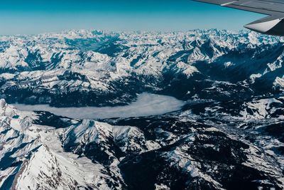 Aerial view of snow covered landscape