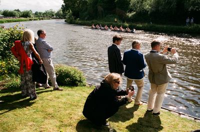 Group of people at riverbank