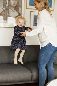 Mother and daughter playing together