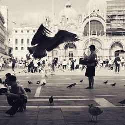 Group of people in town square