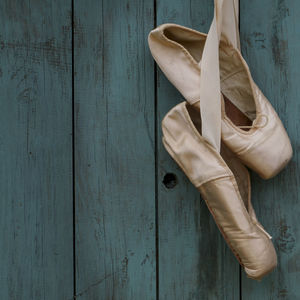 High angle view of shoes on wooden table