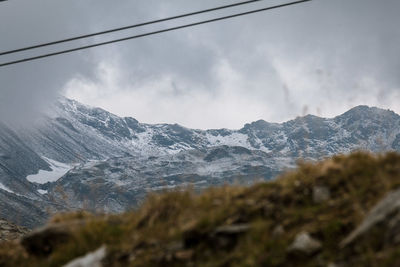 Scenic view of mountains against sky during winter