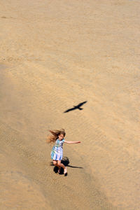 High angle view of woman on beach