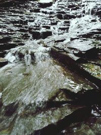 Waves splashing on rocks