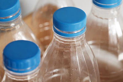 Close-up of glass bottle on table