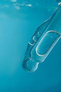 Close-up of dental equipment against blue background