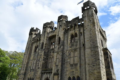 Low angle view of old building against sky