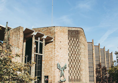 Low angle view of buildings against sky