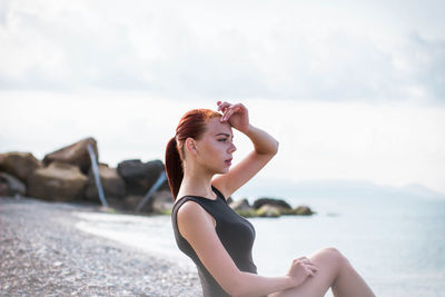 Woman standing on beach