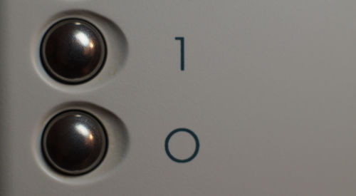 Close-up of electric lamp on door