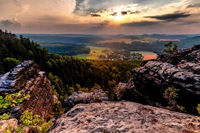 Scenic view of mountains against sky during sunset
