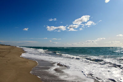 Scenic view of beach against sky