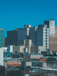 Modern buildings against blue sky