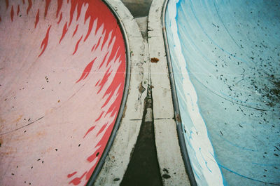 High angle view of footpath by wall