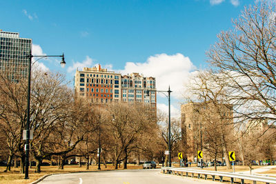 View of buildings and trees in city