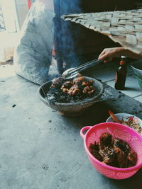 Midsection of man preparing food