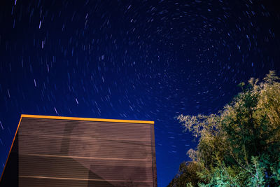 Low angle view of building against sky at night